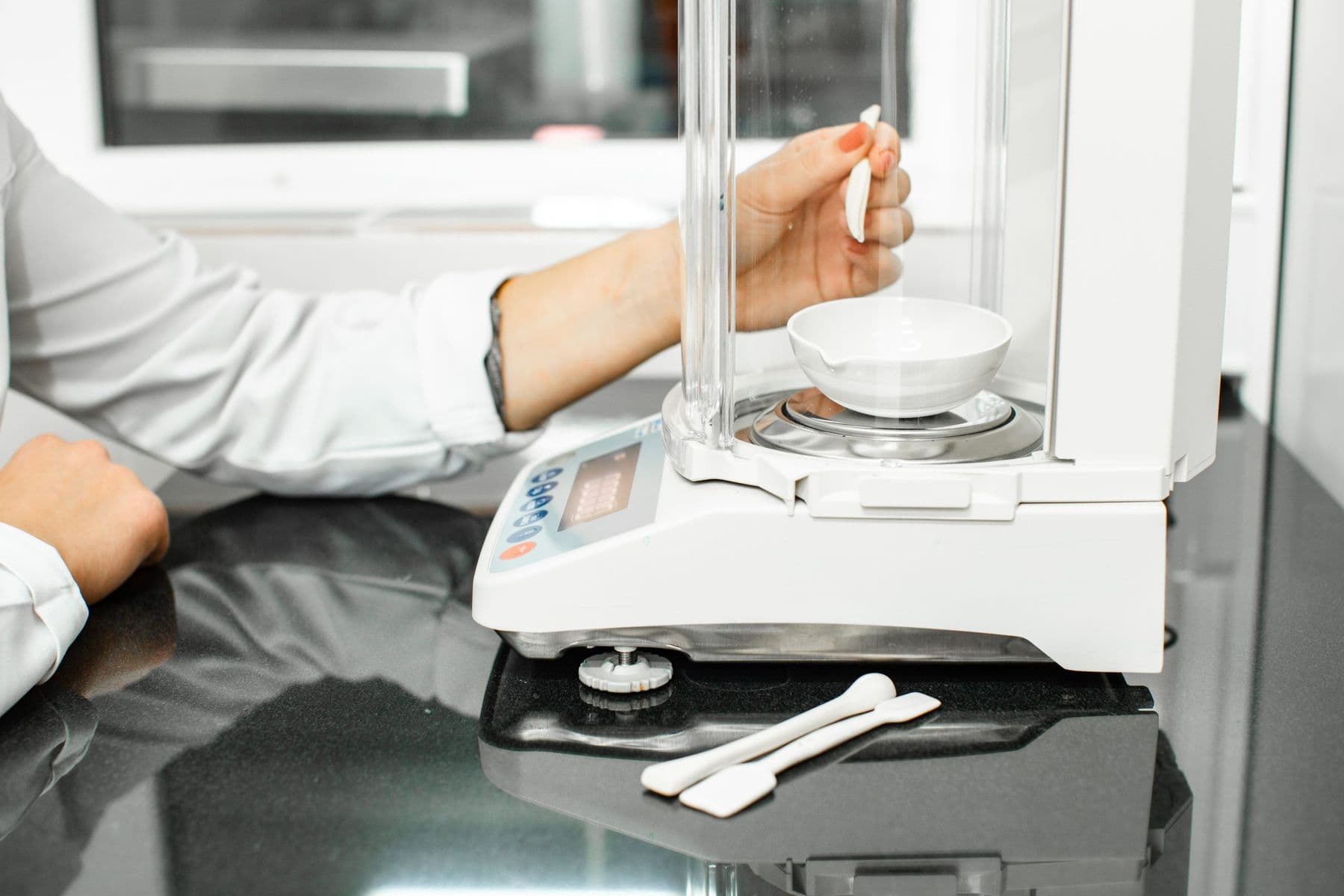 Sample being weighed on an analytical laboratory balance