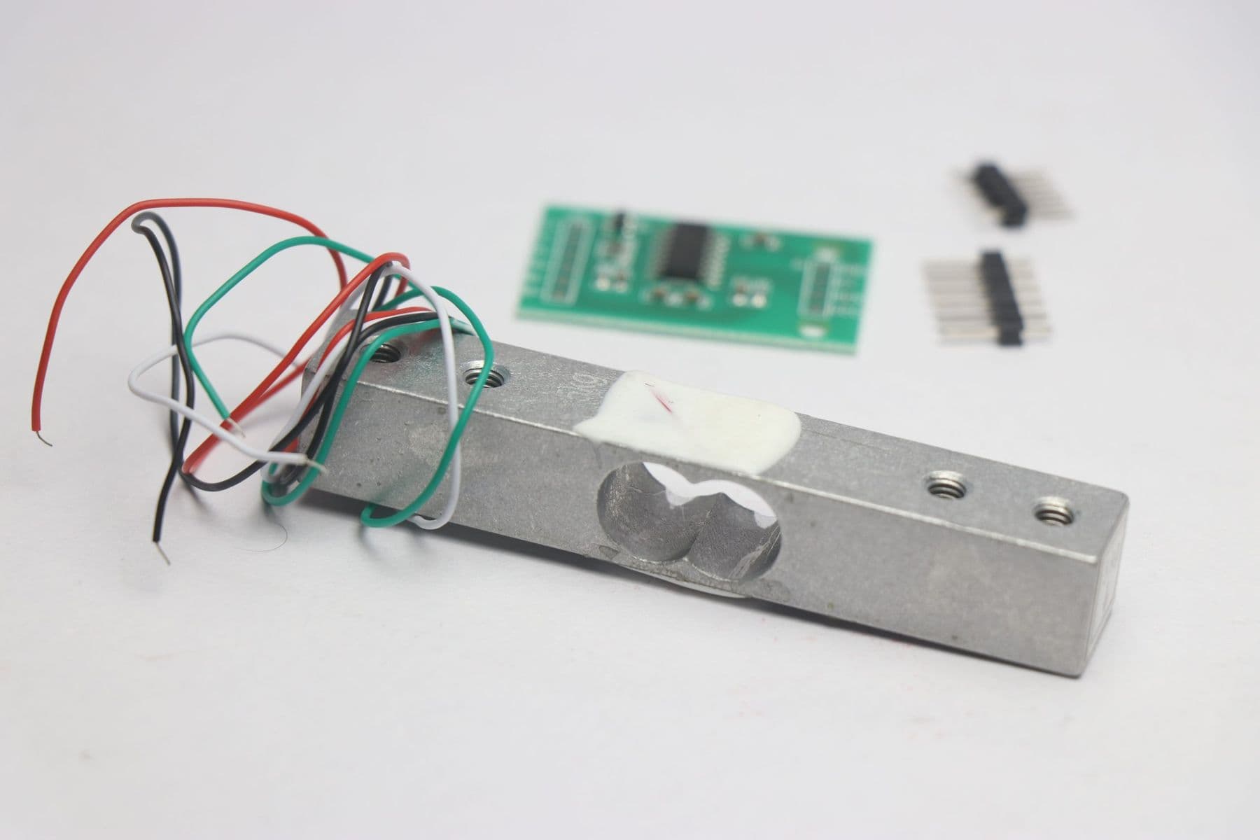 Bar load cell with wiring and circuit board